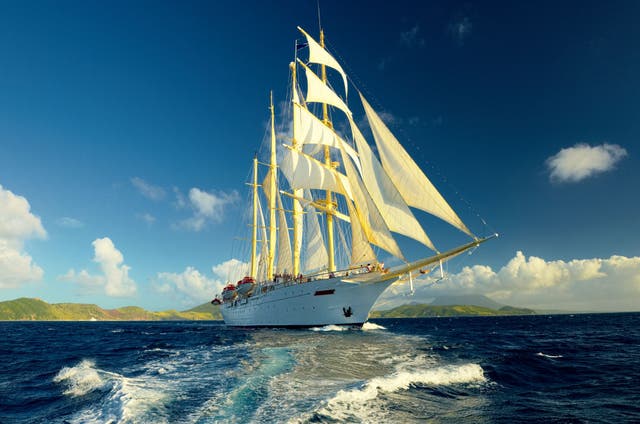 <p>Star Clippers’ ‘Star Flyer’ ship moors off Barbuda’s River Bay, which is half the size of Antigua</p>