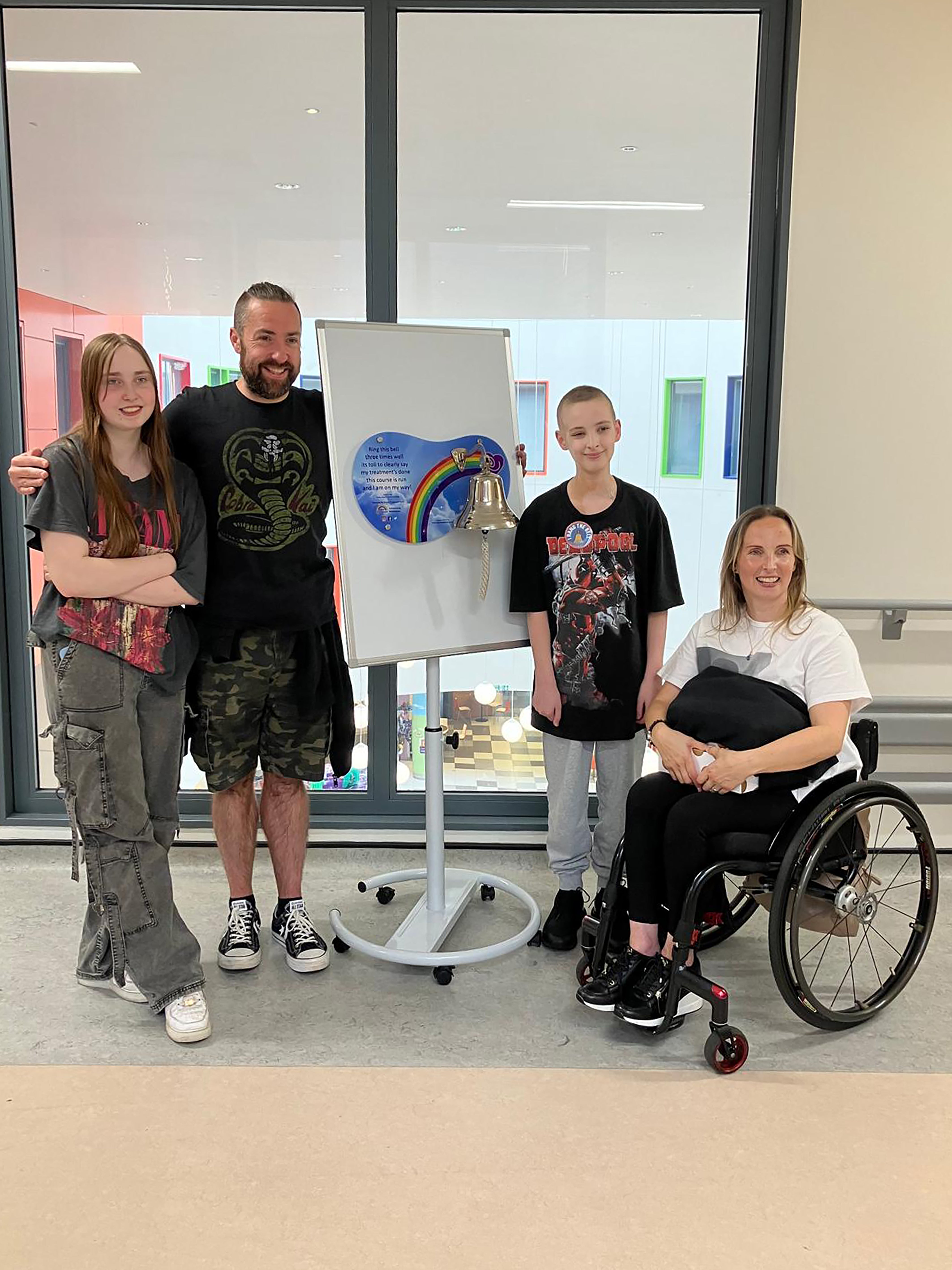 Stephanie Muirhead, right, with husband Derek, daughter Alyssa as her son Andrew, who rang the cancer bell at the end of his treatment