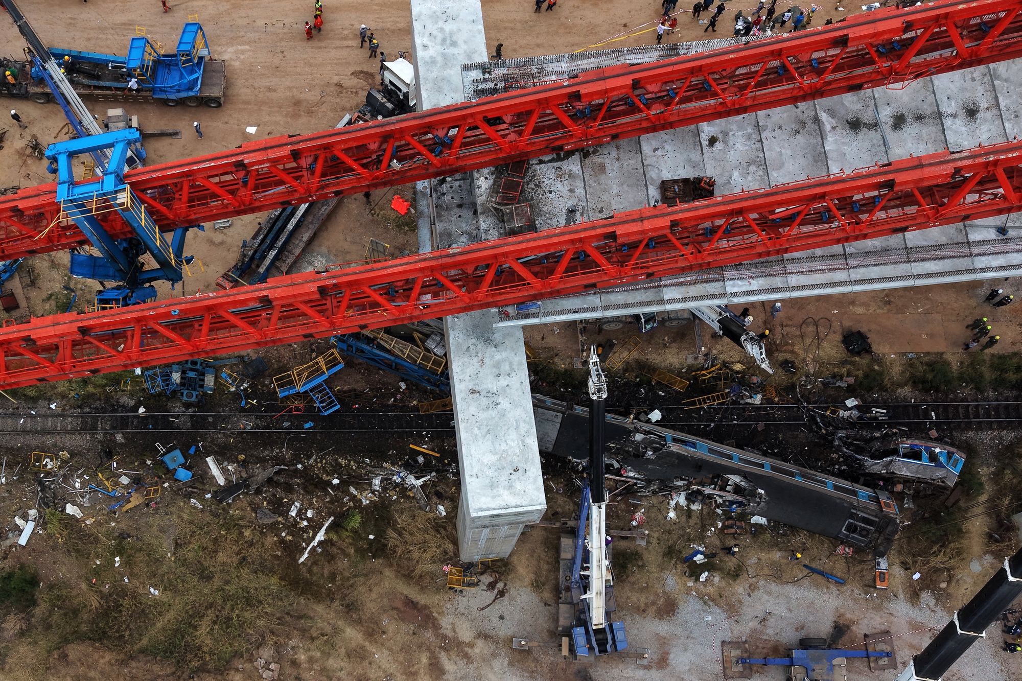 An aerial view of the wreckage of a train that crashed when a construction crane collapsed in Thailand's Nakhon Ratchasima province on January 14, 2026