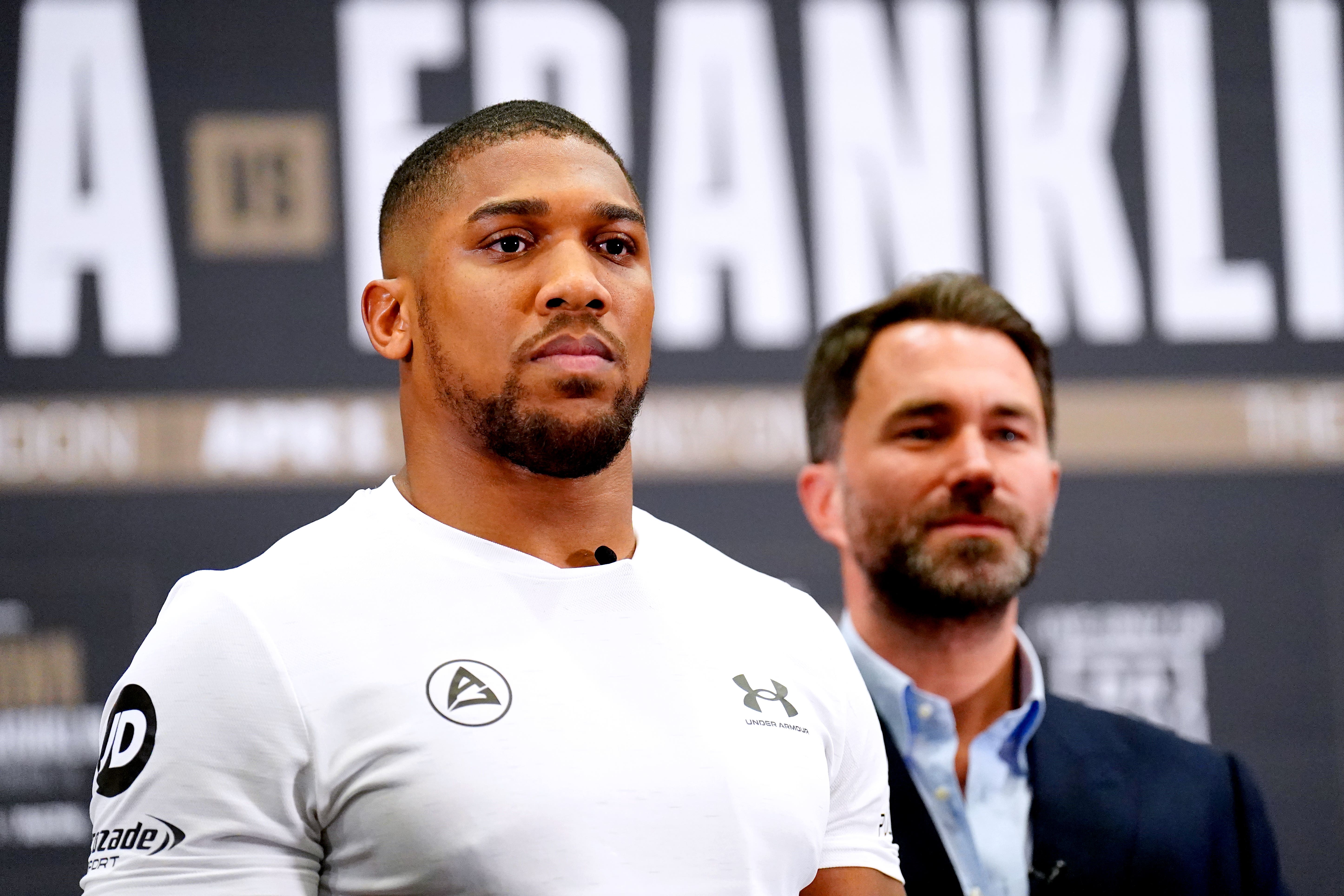 Anthony Joshua’s promoter Eddie Hearn (right) believes he will return to boxing at some point (Zac Goodwin/PA)
