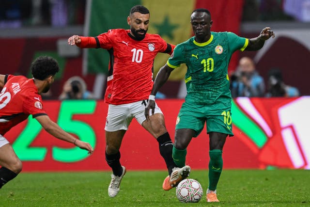 <p>Salah fouled Mane with a trip from behind as he attempted to win the ball </p>