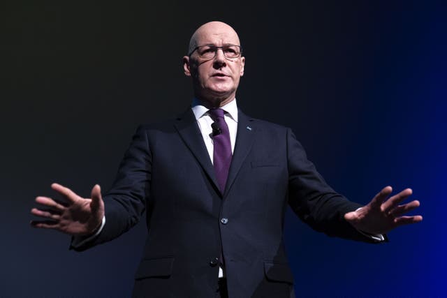 First Minister John Swinney said Reform represented division and hate (Jane Barlow/PA)