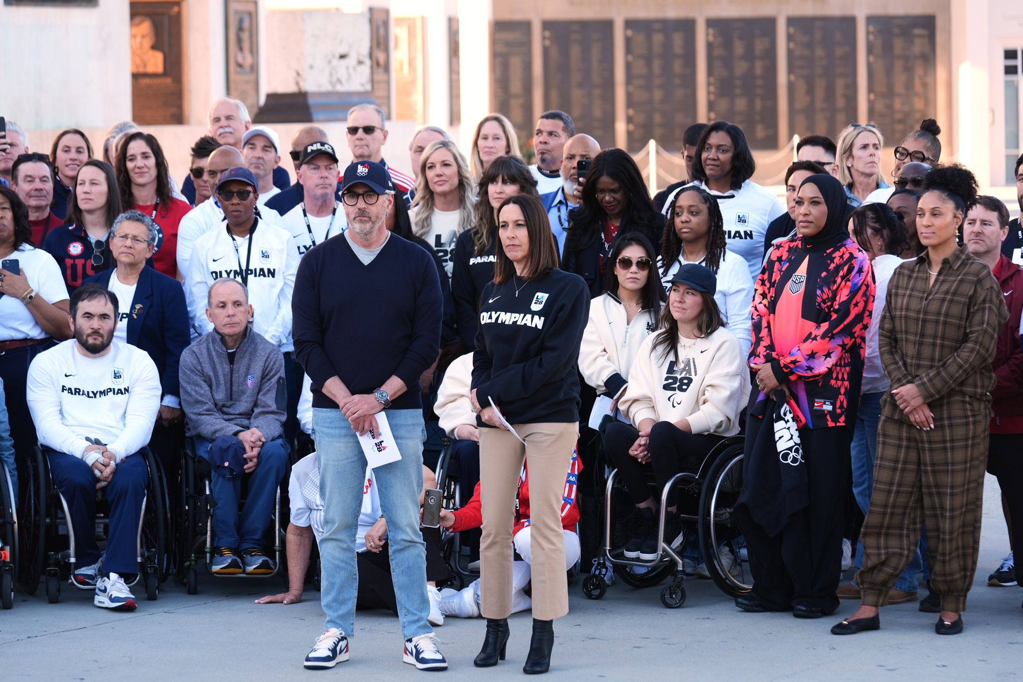 Former Olympian Jane Evans, LA28 Chief Athlete Officer, center right, stands next to Casey Wasserman, LA28 Chairperson and President, at the Los Angeles Memorial Coliseum ahead of the launch for ticket registration to the 2028 Summer Olympic Games