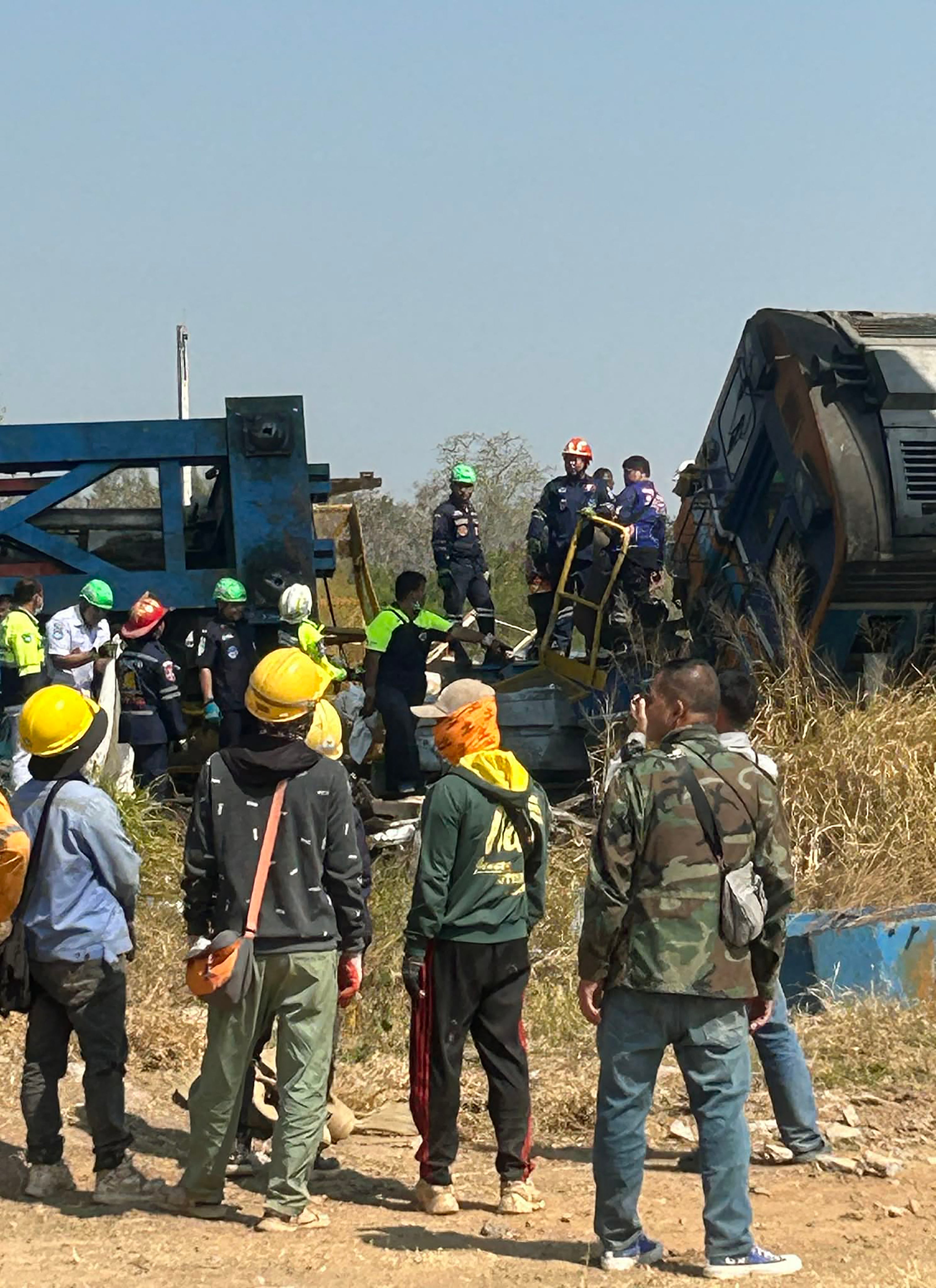 Rescue workers are digging through debris to find trapped passengers