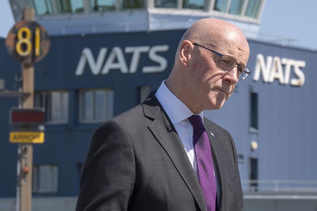 John Swinney said he will ensure Scottish Government-owned airports are used in accordance with international law (Jane Barlow/PA)