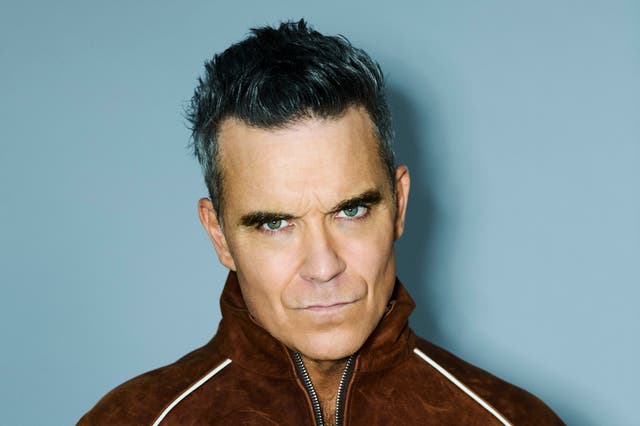 <p>Robbie Williams has broken The Beatles' record for the most UK number one albums, with his latest release securing his 16th chart-topping solo effort</p>