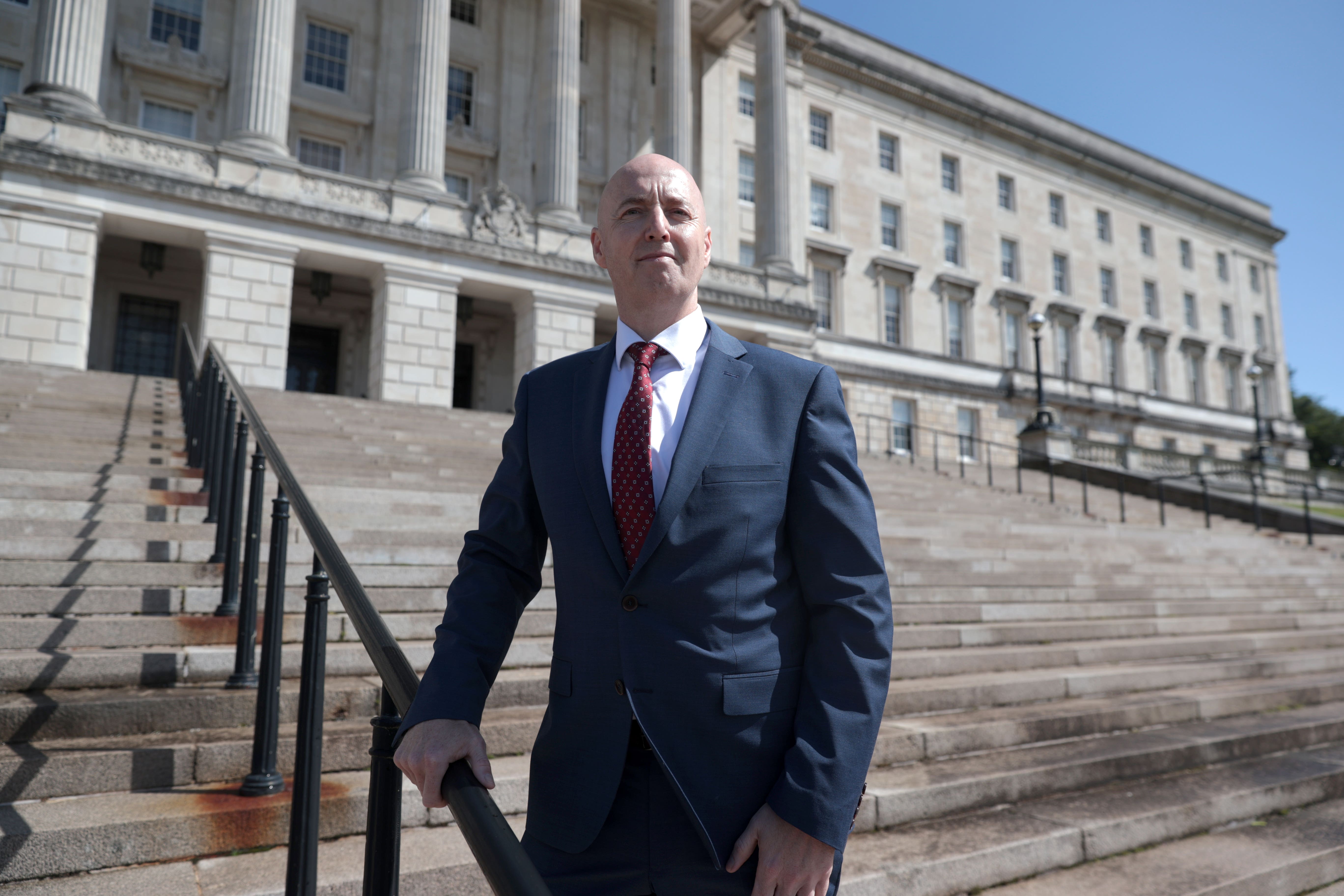UUP MLA Jon Burrows on the steps of the Parliament Buildings, Stormont (Liam McBurney/PA)