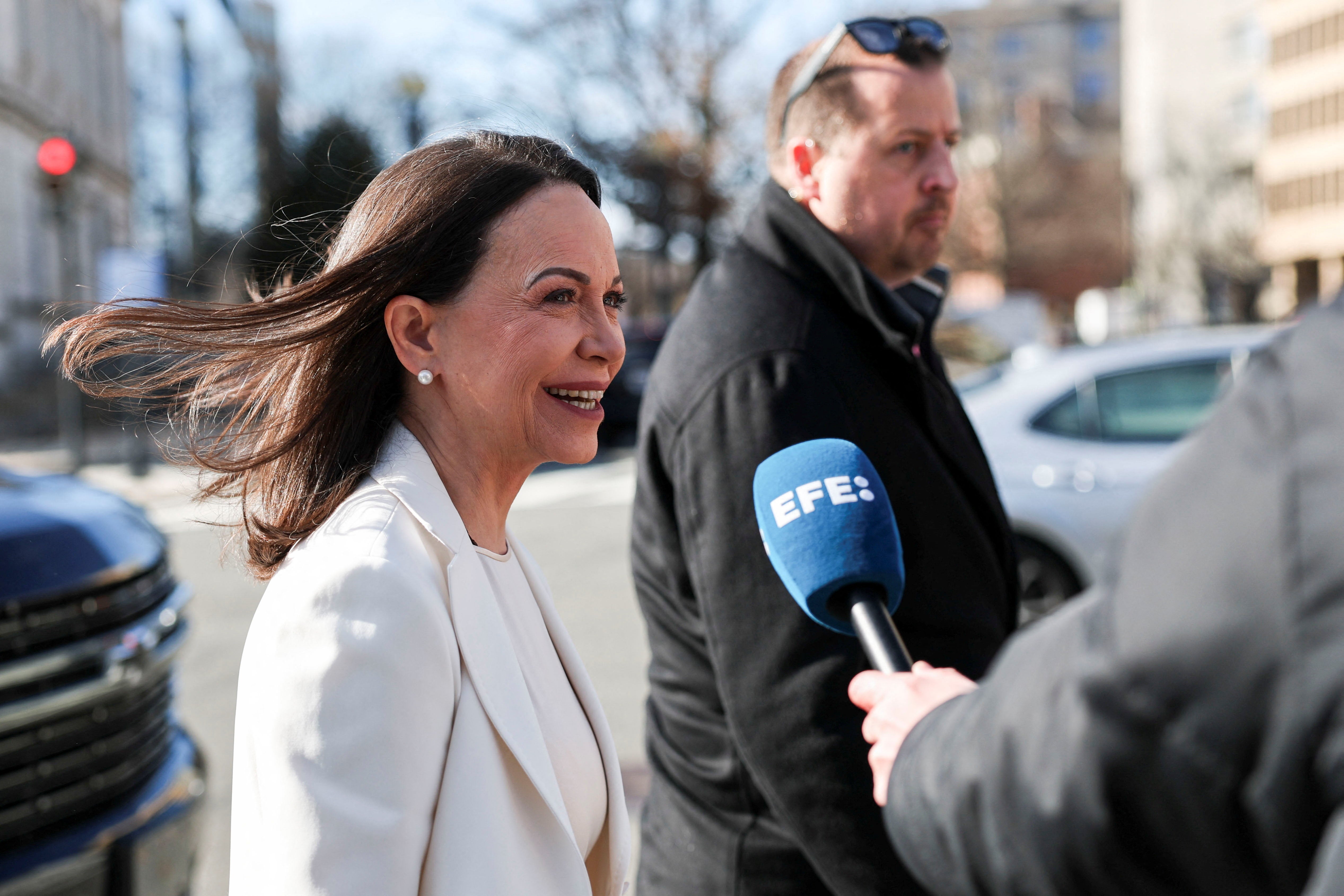 <p>Venezuelan opposition leader Maria Corina Machado walks on the day of a meeting with U.S. President Donald Trump at the White House in Washington, D.C., U.S., January 15, 2026</p>