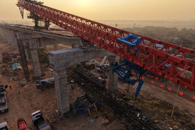 <p>At least 32 people were dead and 64 injured after crane collapses on train in Thailand</p>