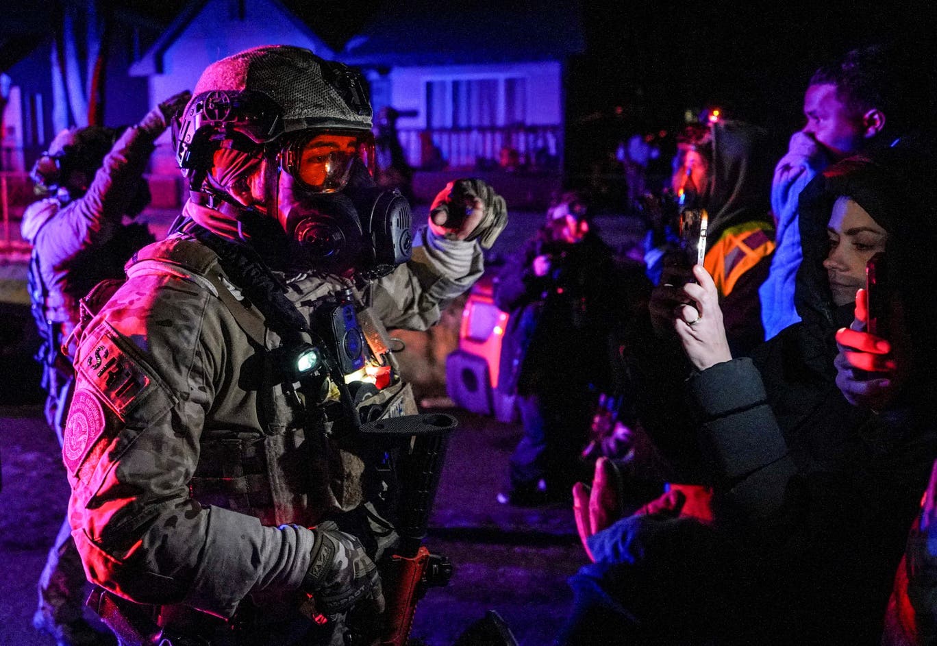 ICE officials and protesters in Minneapolis