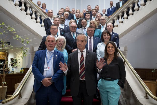 <p>Reform UK leader Nigel Farage poses for a picture during a visit to Kent County Council</p>