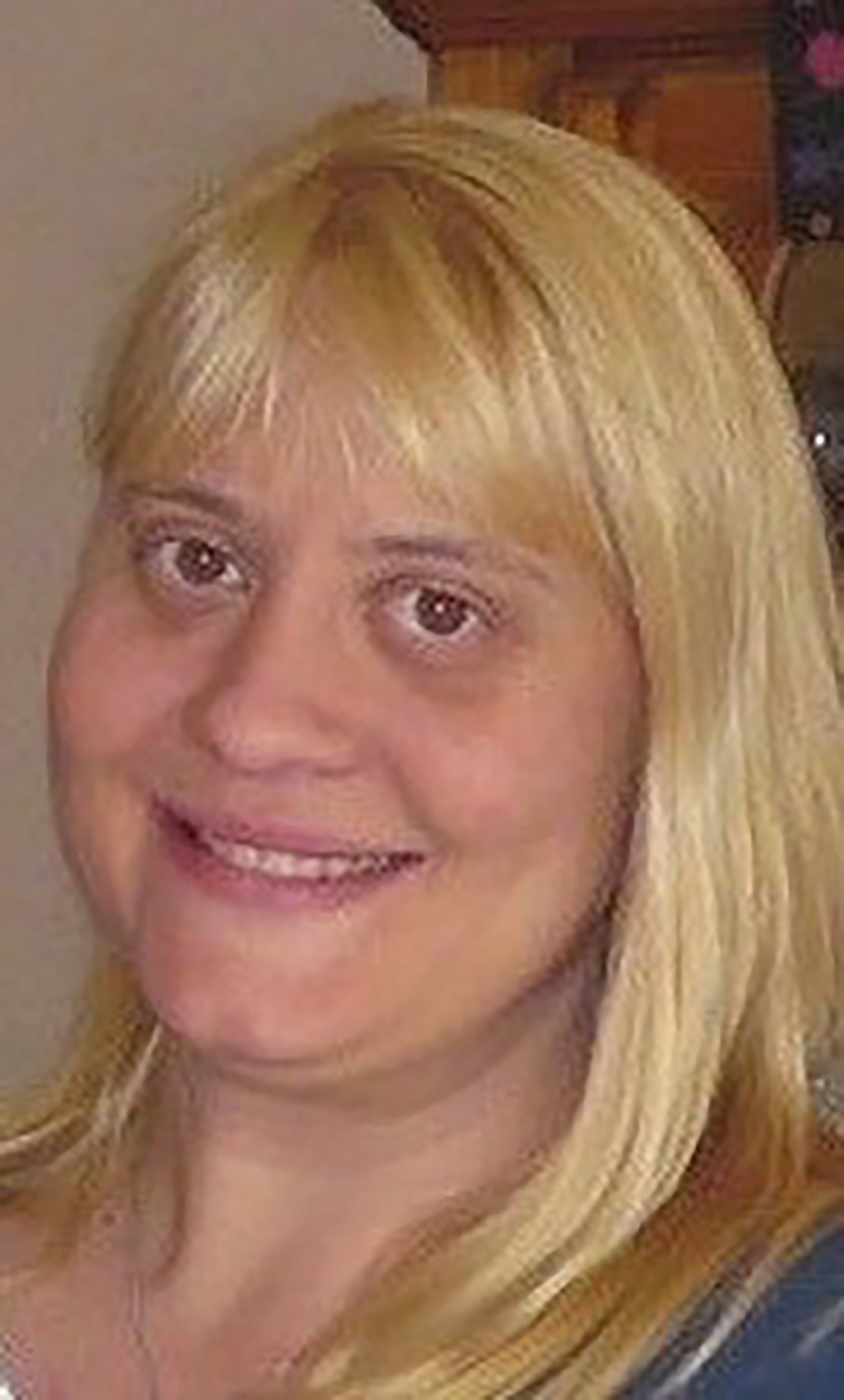 Dawn Rhodes was killed in her kitchen at her home in Redhill in 2016