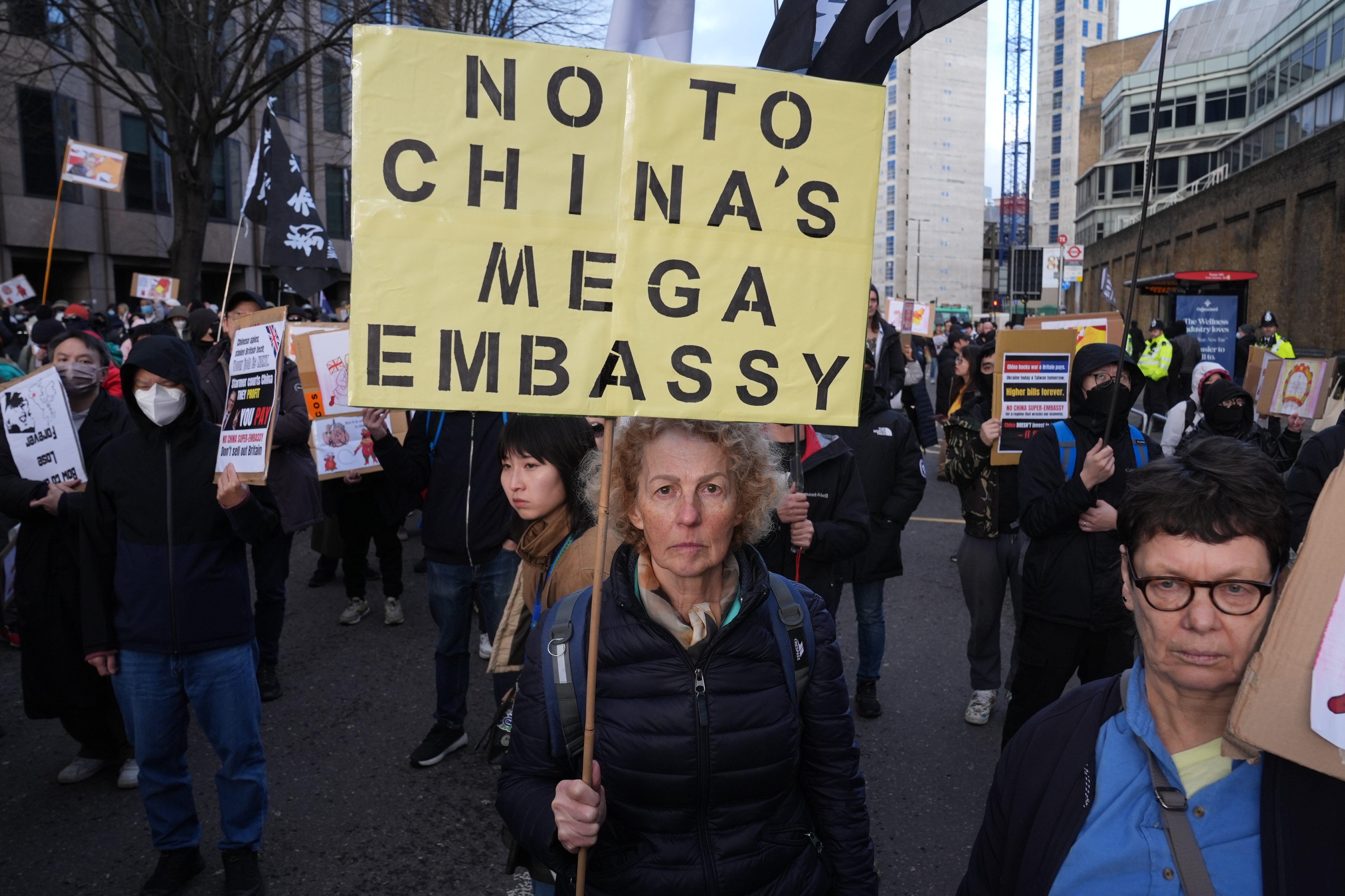 Protesters gathered outside Royal Mint Court, London, the site of the proposed new Chinese embassy (Lucy North/PA)