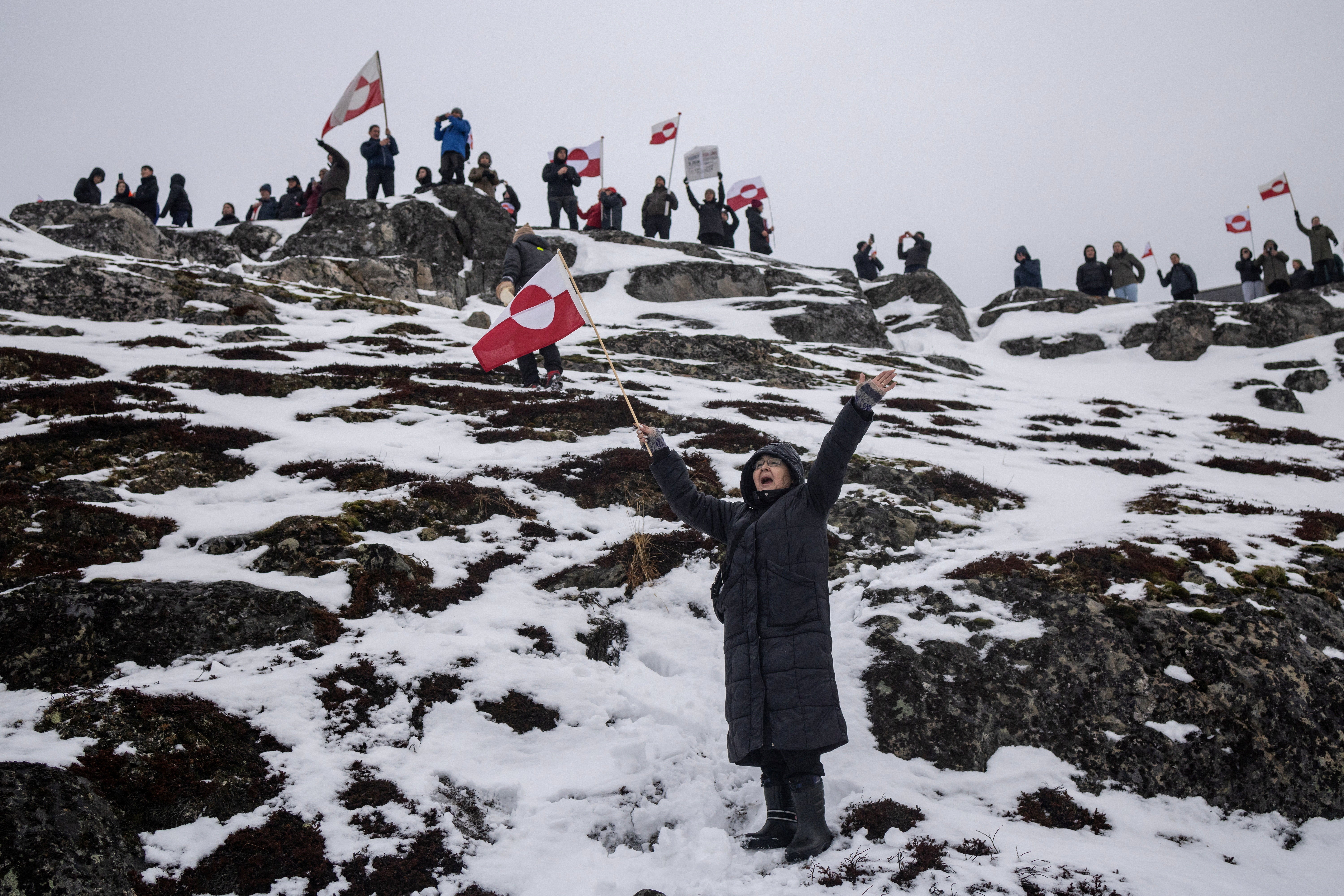 People attend a protest against President Donald Trump's demand that the Arctic island be ceded to the U.S., calling for it to be allowed to determine its own future, in Nuuk, Greenland, January 17