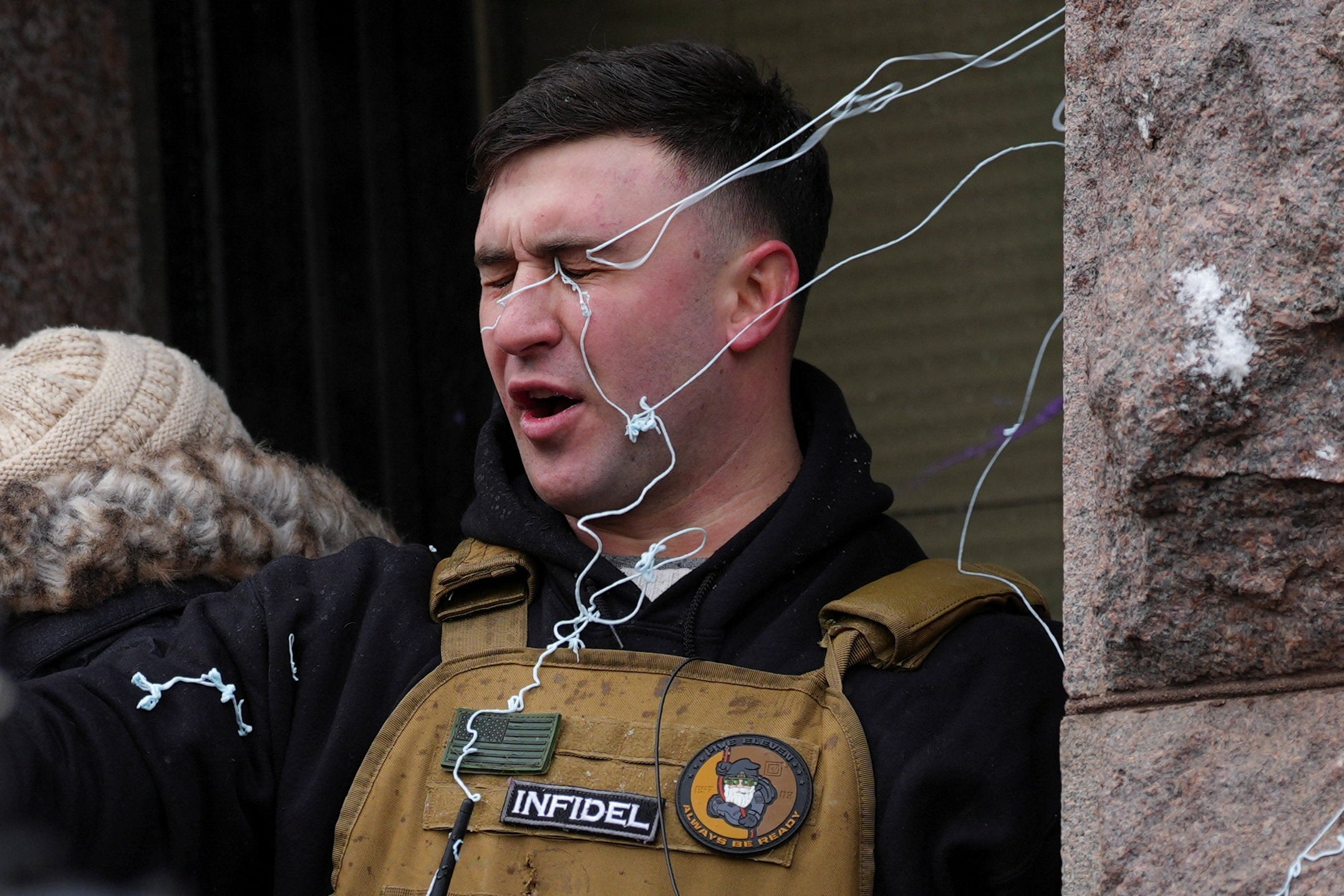 Lang, who was charged with attacking police officers with a bat at the US Capitol on January 6, 2021, was hit with silly string during his pro-ICE rally on January 17