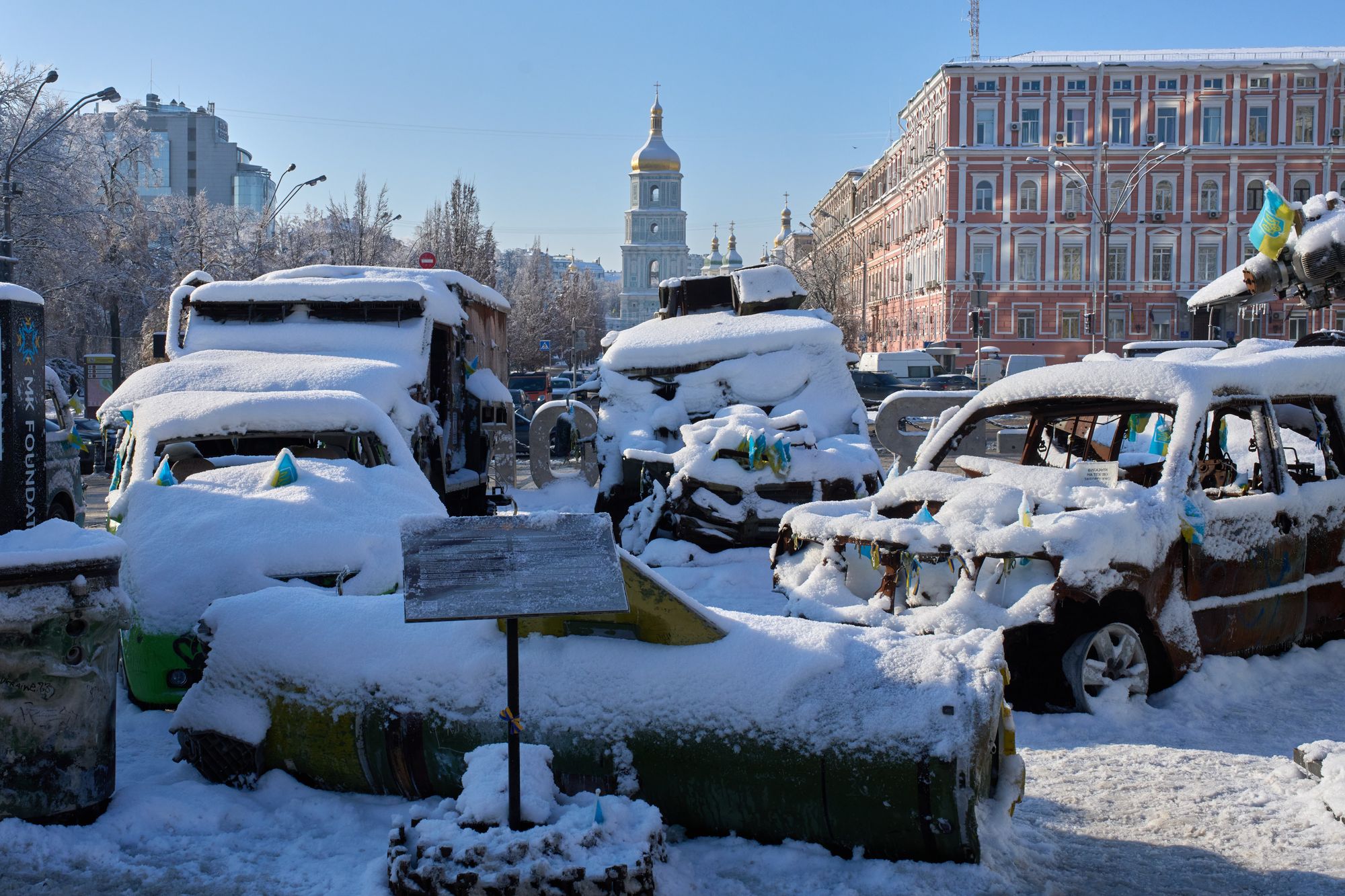 Snow covered, damaged Russian military vehicles are on display in downtown Kyiv, Ukraine