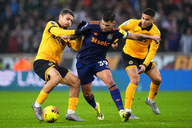 <p>Wolves’ Andre and Newcastle’s Bruno Guimaraes battle for possession in a drab 0-0 draw</p>