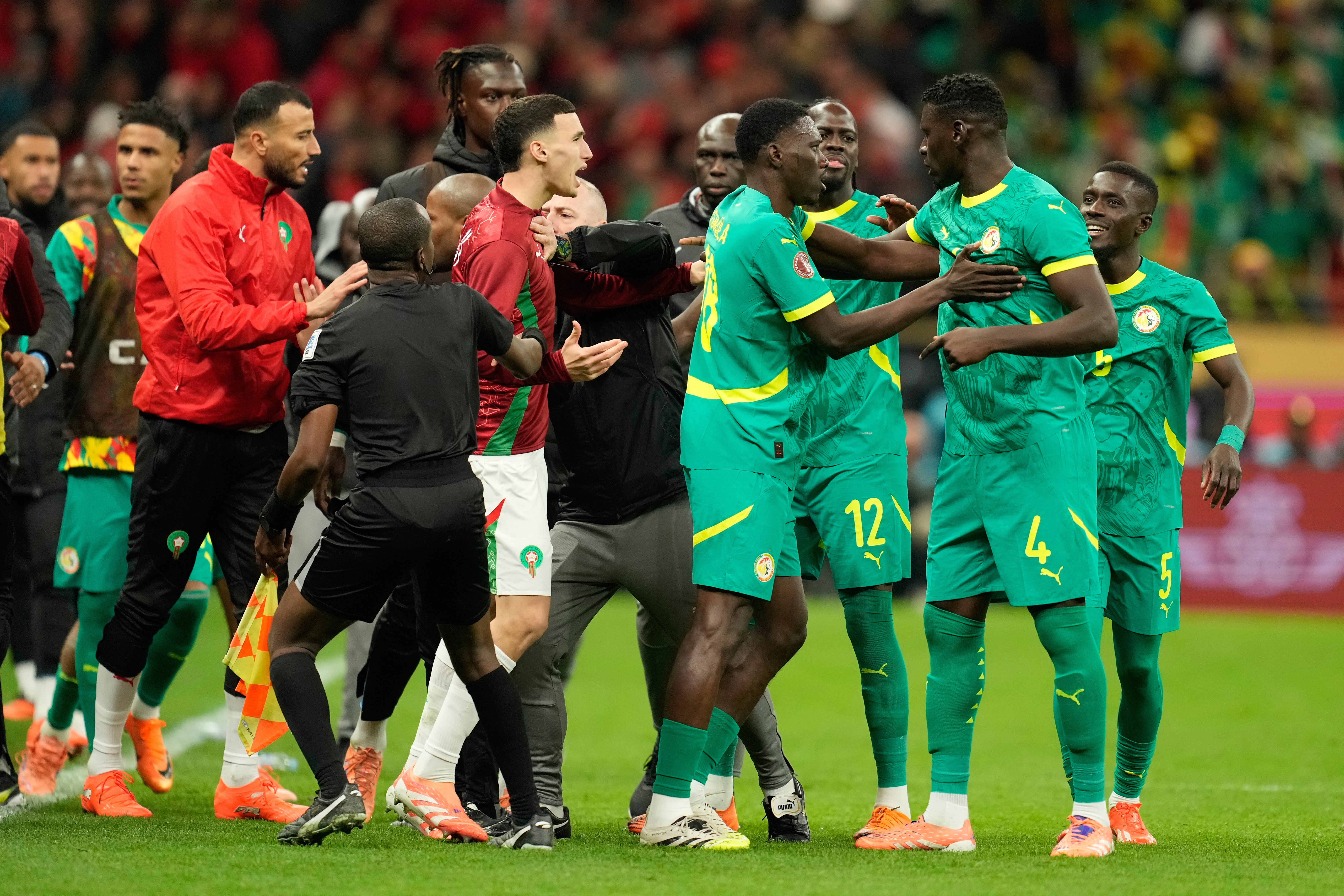 Senegal coach Pape Thiaw took his players off the pitch after a controversial late penalty was awarded to Morocco (Mosa’ab Elshamy/AP/PA)
