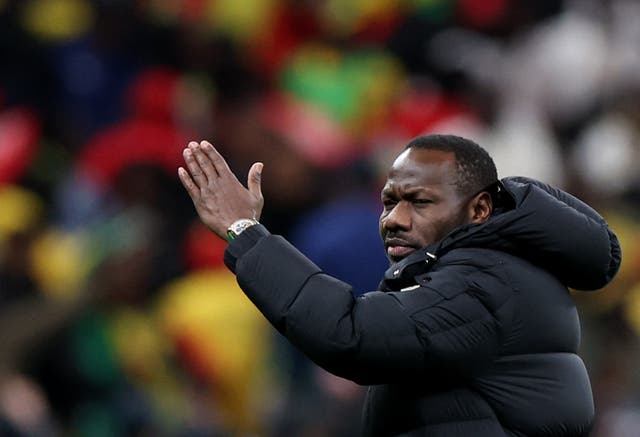 <p>Senegal manager Pape Thiaw ordering his players off the pitch</p>