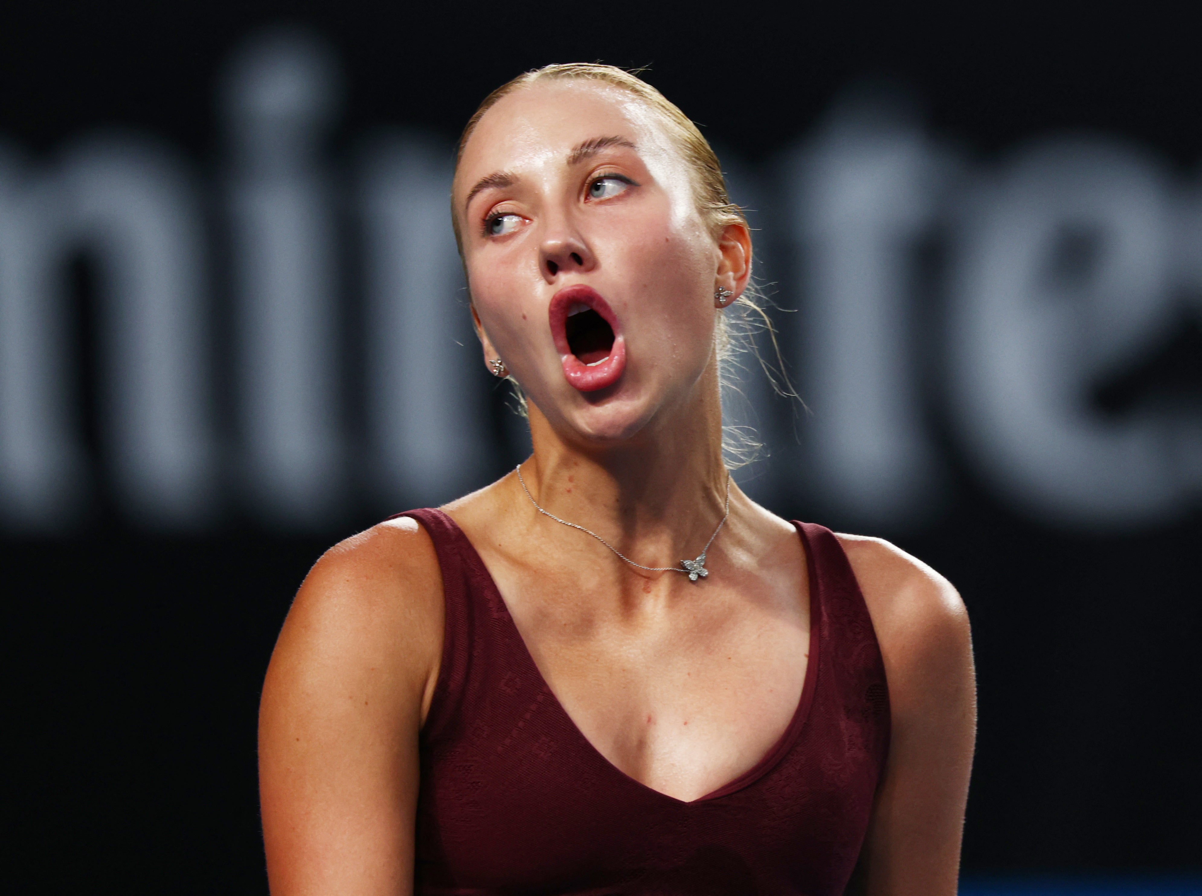 <p>Russian-born Anastasia Potapova reacts during her first round match against Netherlands' Suzan Lamens </p>