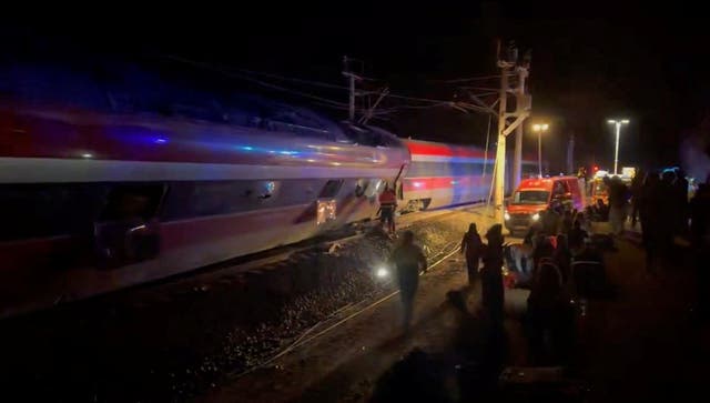 <p>Emergency responders work at the site after a high-speed train derailed and smashed into another oncoming train, near Adamuz, in Cordoba province, Spain, January 18, 2026 </p>