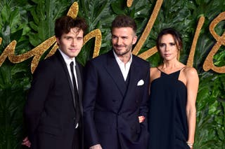 Brooklyn, David and Victoria Beckham in 2018 (Ian West/PA)