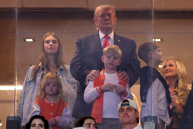 <p>President Donald Trump, accompanied by his eldest daughter Ivanka and granddaughter Kai, got a thunderous reception at the College Football Playoff national championship game in Miami Monday night</p>