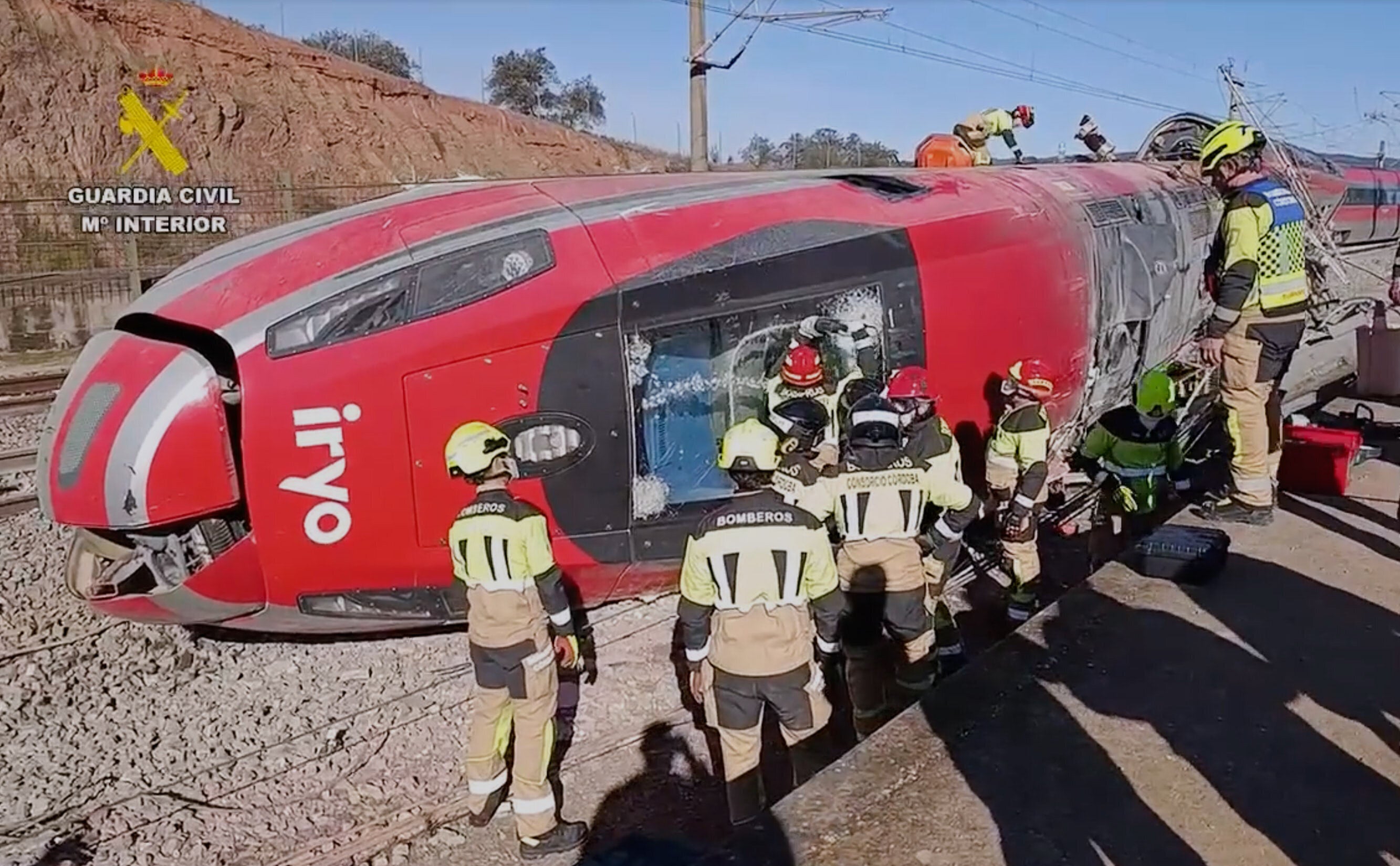 <p>In this grab taken from video provided by Guardia Civil, rescue workers at the scene following a high-speed train collision, in Adamuz, Spain, Monday, Jan. 19, 2026. (Guardia Civil via AP)</p>