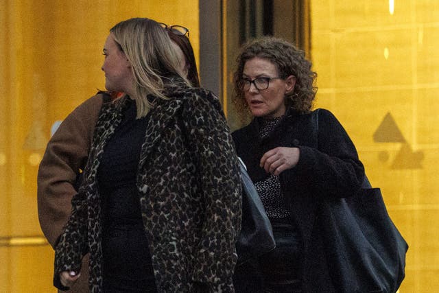 Fiona Donohoe (right), the mother of Noah Donohoe, leaving Belfast Coroner’s Court, after attending the inquest into the death of 14-year-old Noah (Liam McBurney/PA)