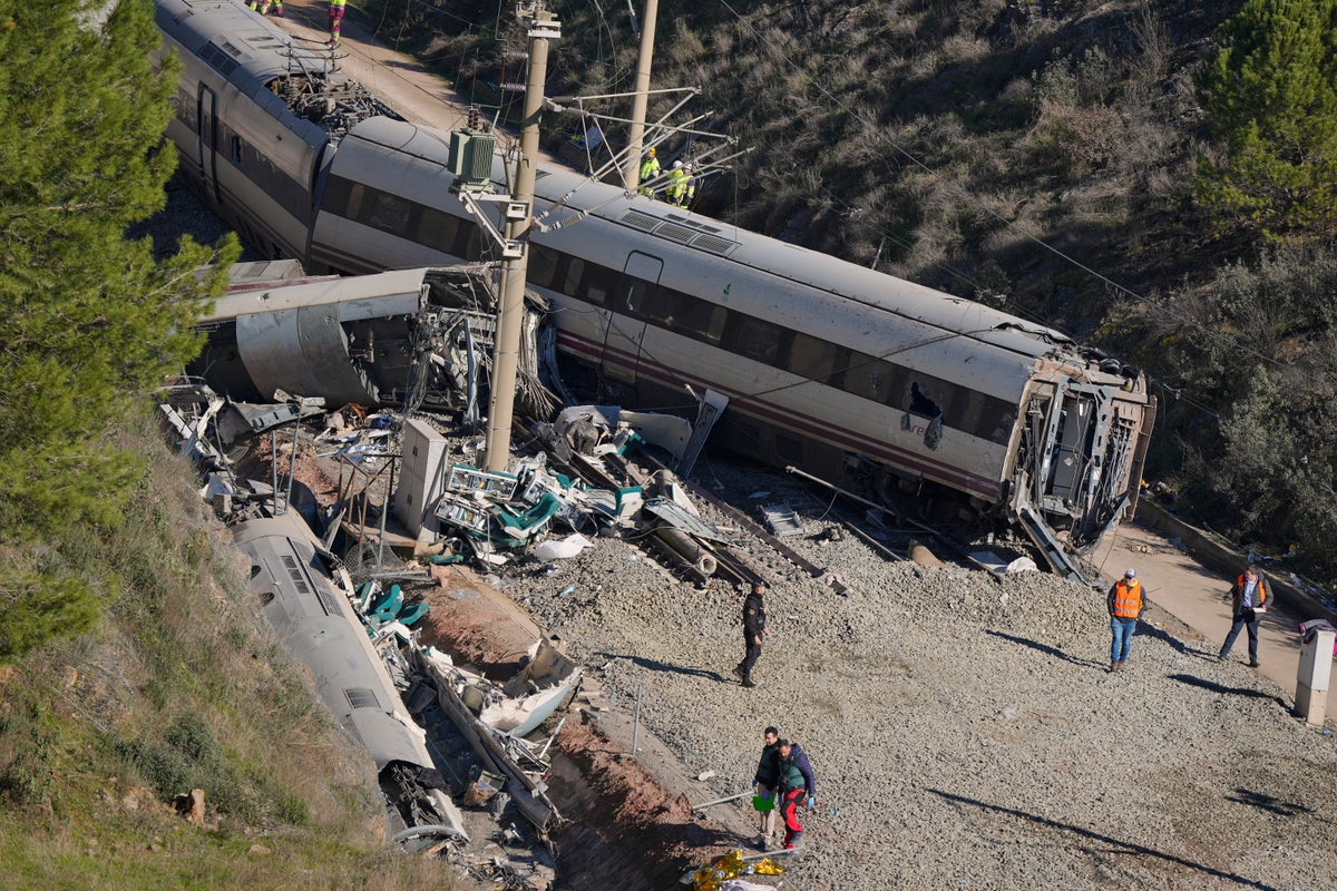 Spain train crash investigators hunt for remaining bodies in wreckage as death toll rises