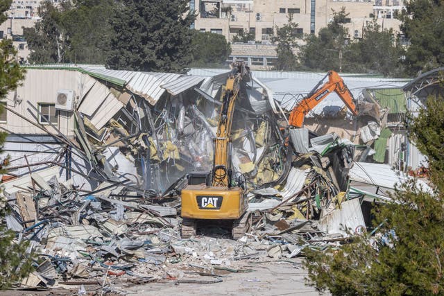 <p>Bulldozers destroy part of the UNRWA headquarters in the Sheikh Jarrah neighbourhood of Israeli-annexed East Jerusalem</p>