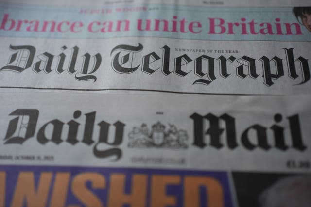 <p>The mastheads of the Daily Mail and Daily Telegraph newspapers (Yui Mok/PA)</p>