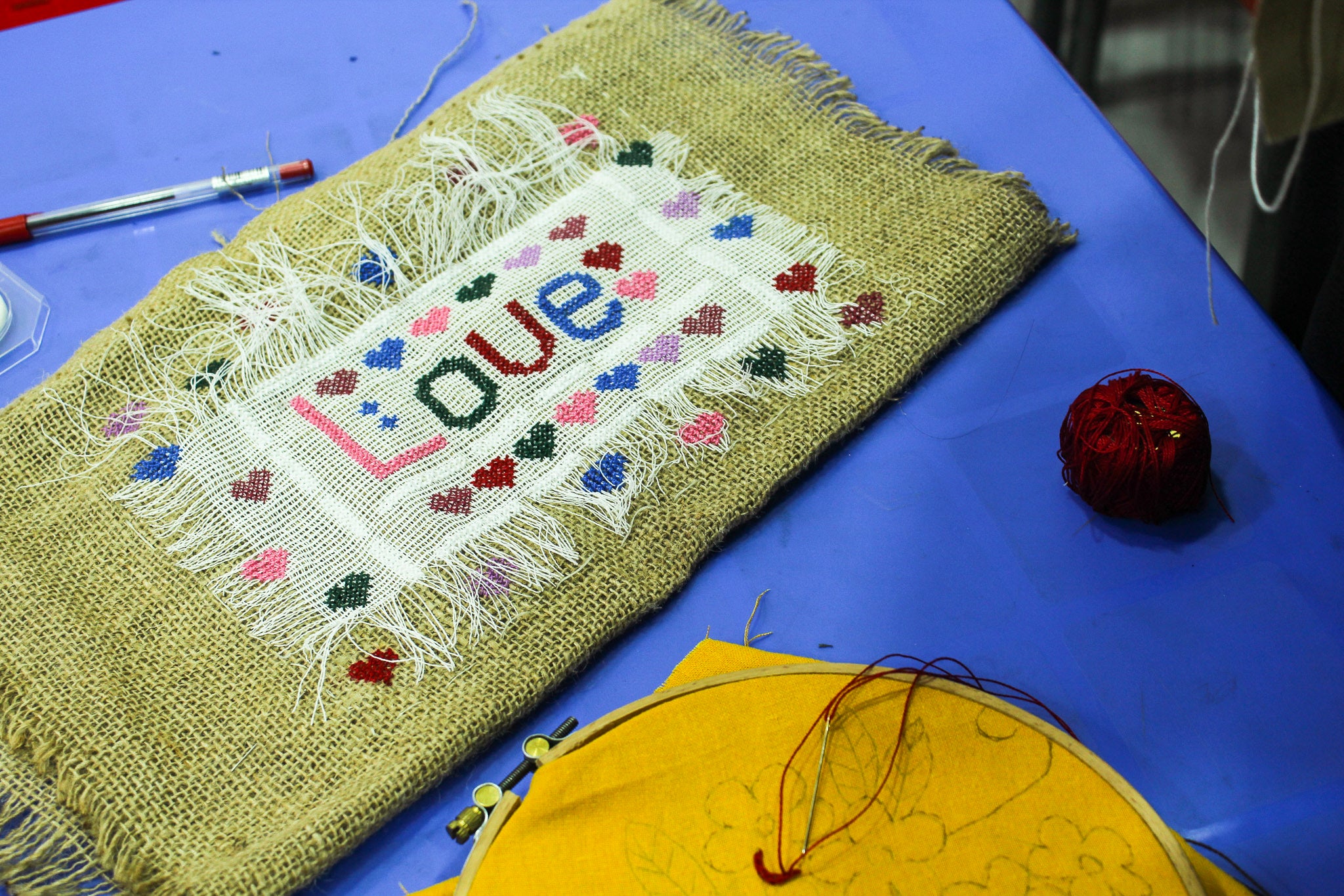 Hand embroidery done by women at the Shams Center for Women and Girls in Homs