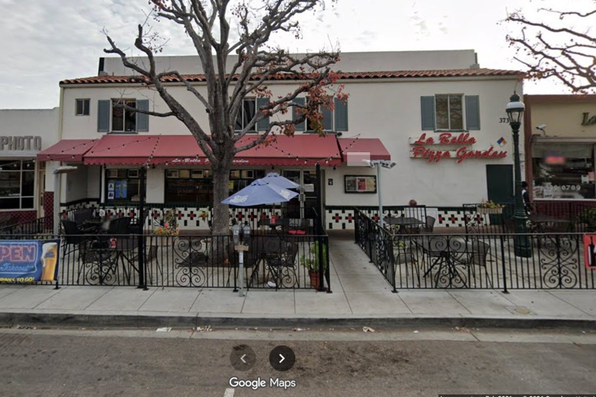 Four people arrested for using ‘variety of weapons’ to beat a man to death on the patio of a pizza restaurant 20 years ago