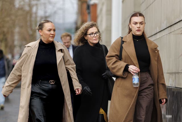 Fiona Donohoe (centre), the mother of 14-year-old Noah Donohoe, outside Belfast Coroner’s Court on Tuesday (Liam McBurney/PA)