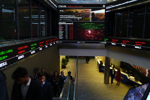The threat of tariffs from US President Donald Trump continued to weigh heavy on European markets, while screens on Wall Street were a sea of red as trading resumed following Monday’s public holiday (Jonathan Brady/PA)