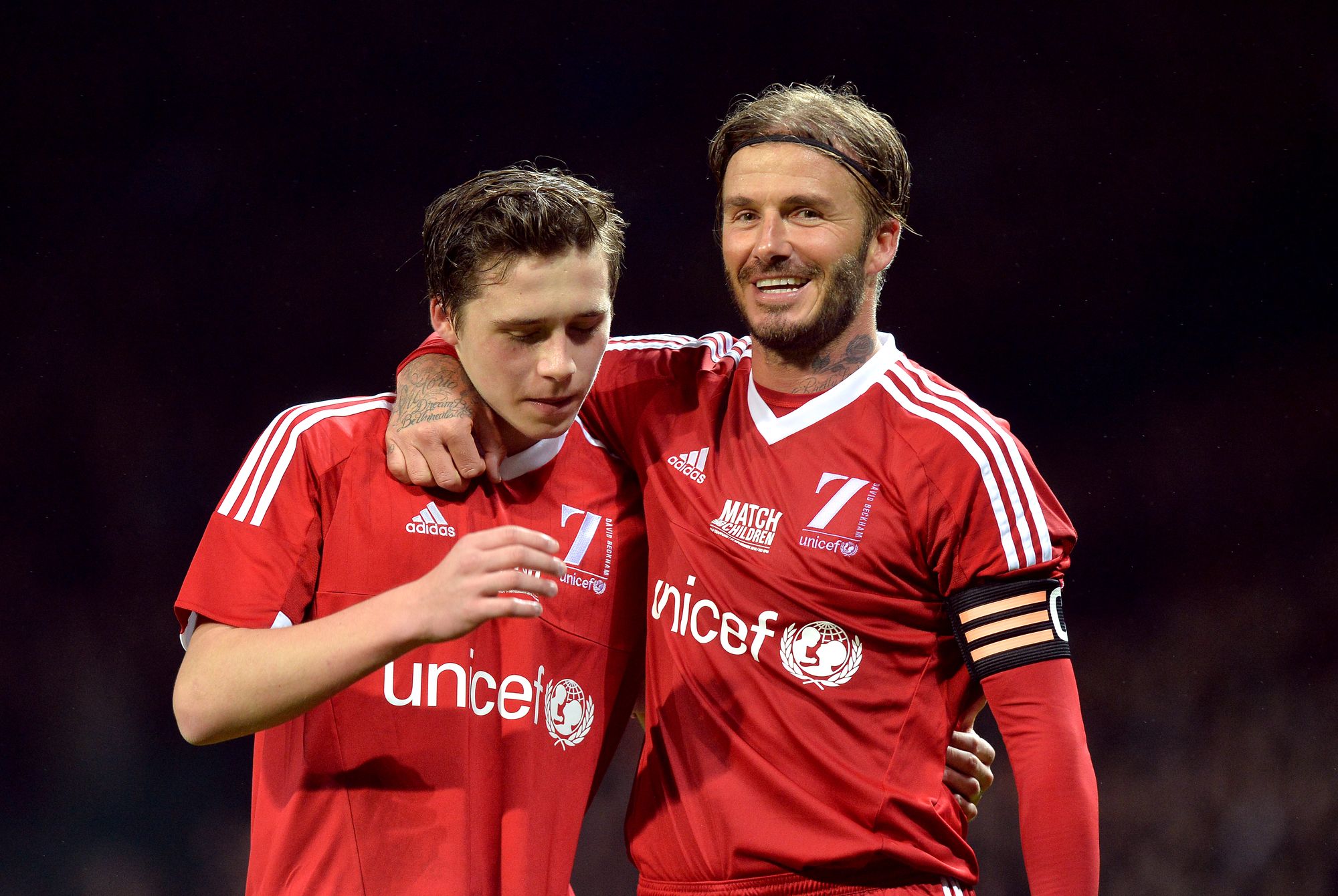 David and Brooklyn Beckham during a Unicef charity match at Old Trafford, Manchester. Photo: Martin Rickett/PA Wire