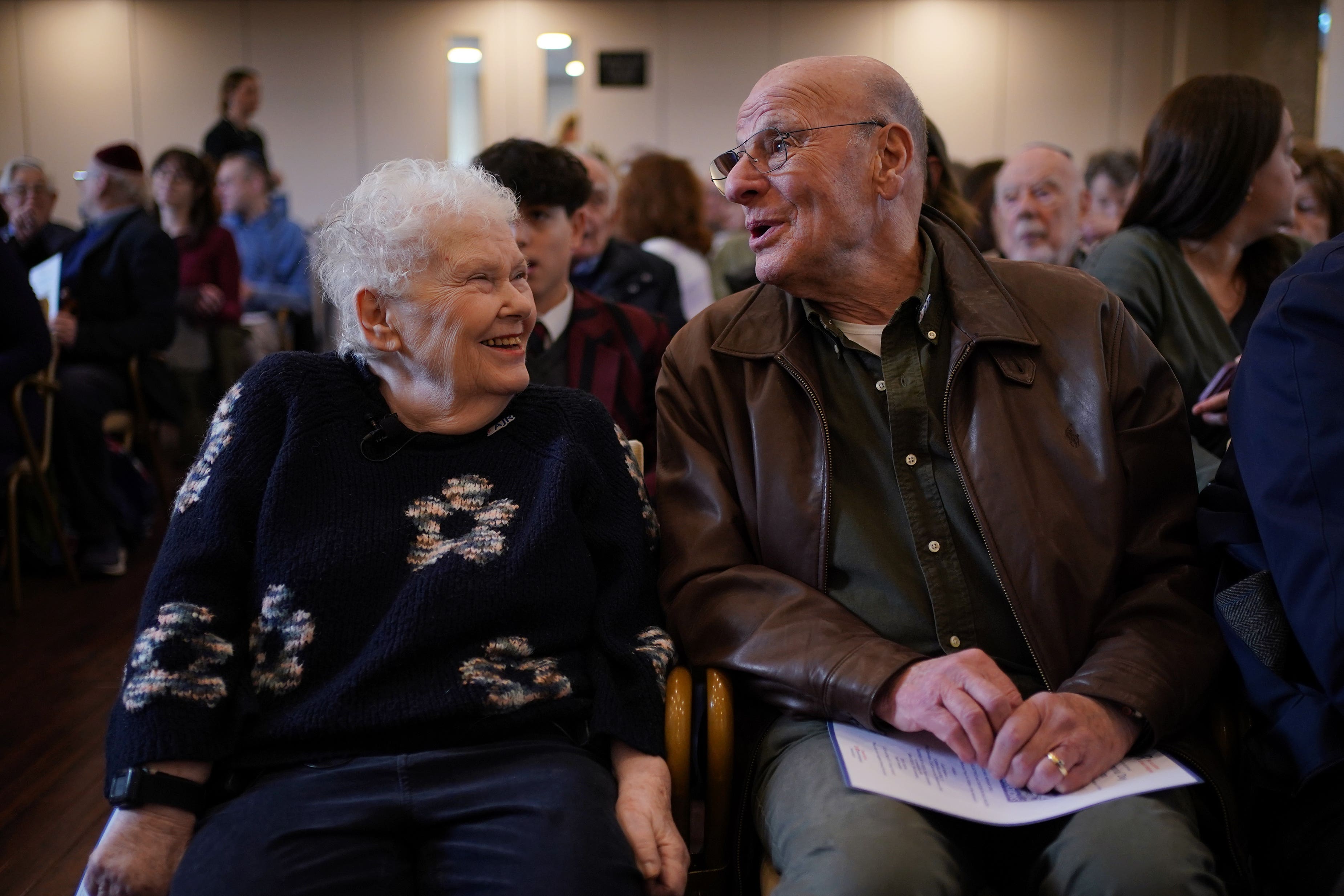 Holocaust survivors Joanna Millan (left) and Jackie Young, who were both Windermere Children, attending the Association of Jewish Refugees (AJR) Holocaust Memorial Day Service, at Belsize Square Synagogue in London