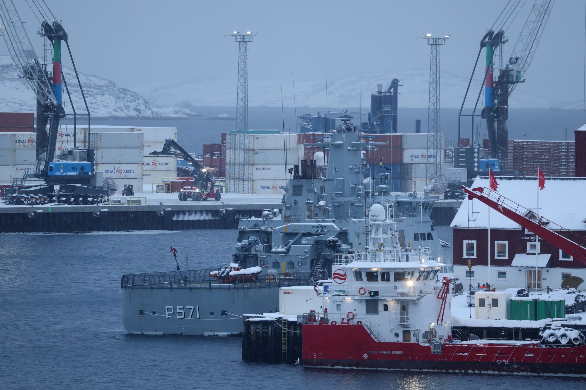 Ships, including the HDMS Knud Rasmussen patrol ship of the Danish Navy, and shipping containers lie in Nuuk Port on January 19, 2026 in Nuuk, Greenland