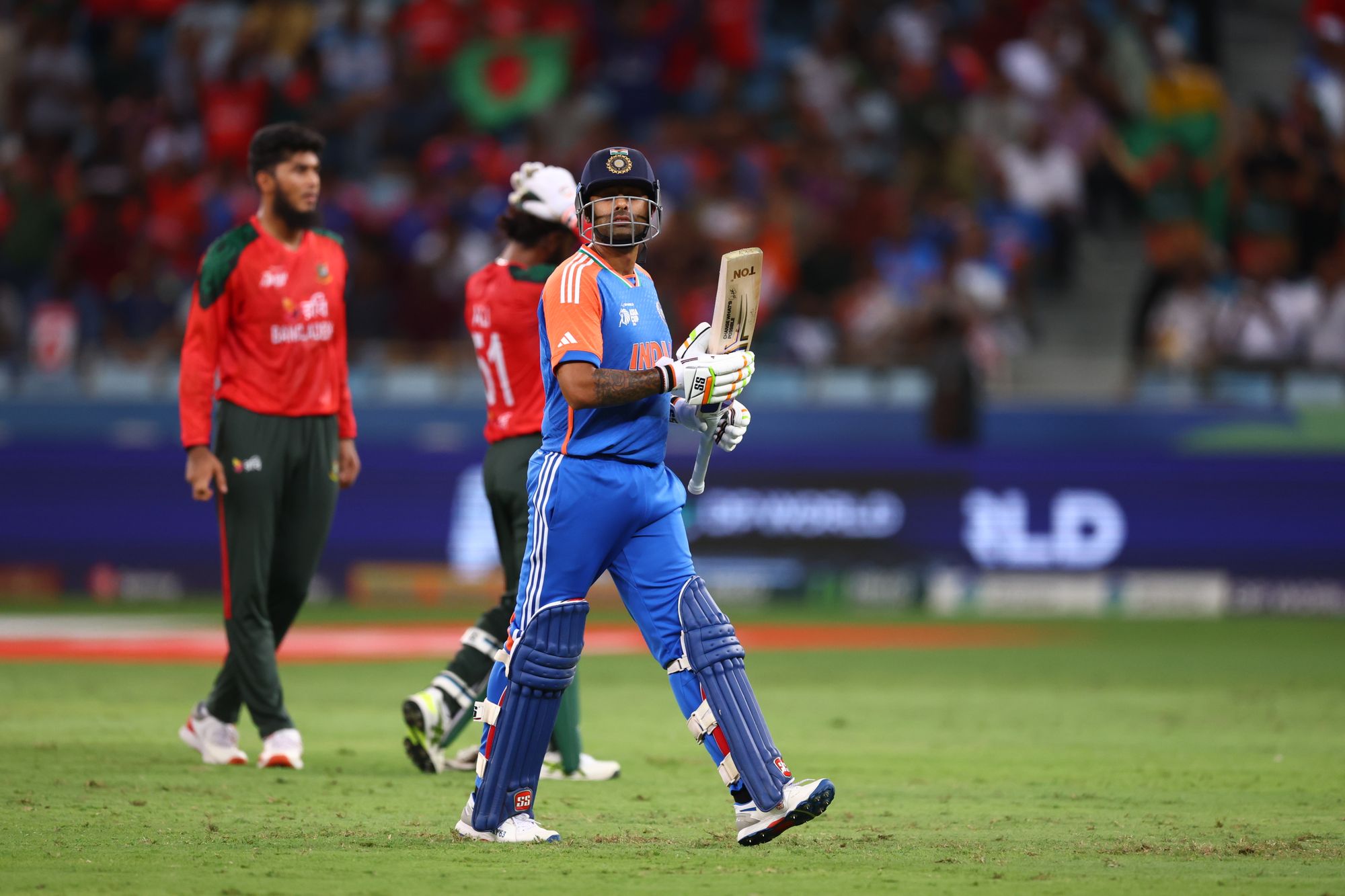 Suryakumar Yadav of India leaves the field after being dismissed by Mustafizur Rahman of Bangladesh during the Asia Cup match between India and Bangladesh at Dubai International Stadium on 24 September 2025 in Dubai, United Arab Emirates