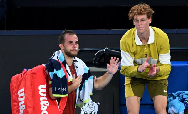 <p>Hugo Gaston walk off the court after retiring from his first round match against Jannik Sinner</p>