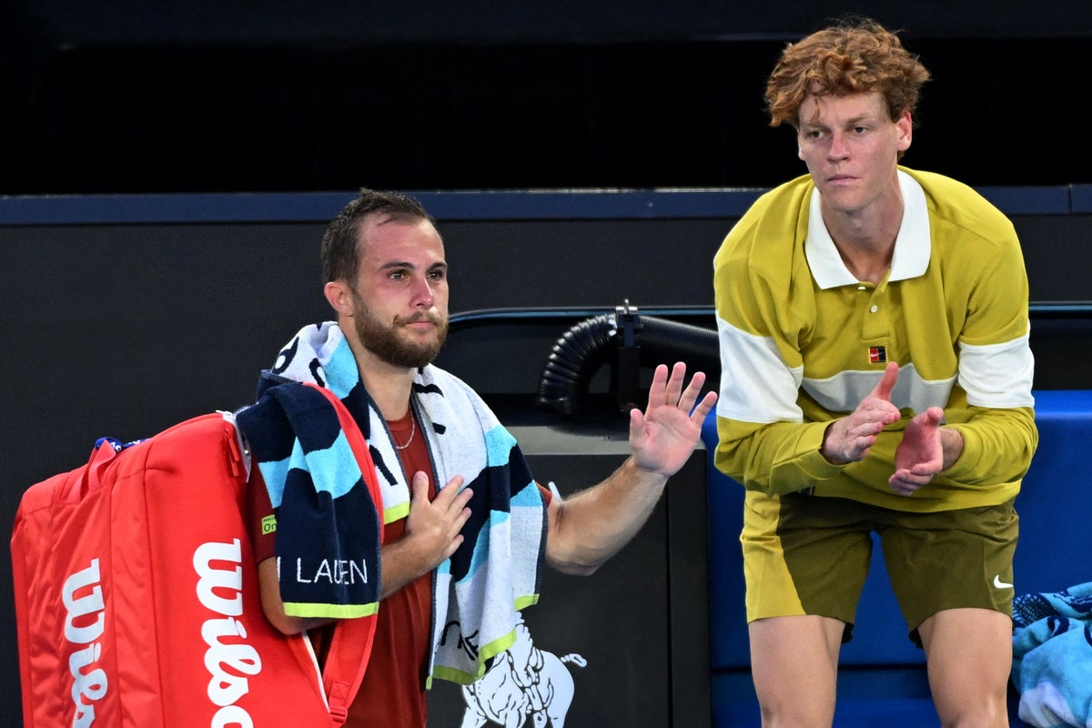 Jannik Sinner consoles opponent after sudden Australian Open retirement Jannik Sinner consoles opponent after sudden Australian Open retirement