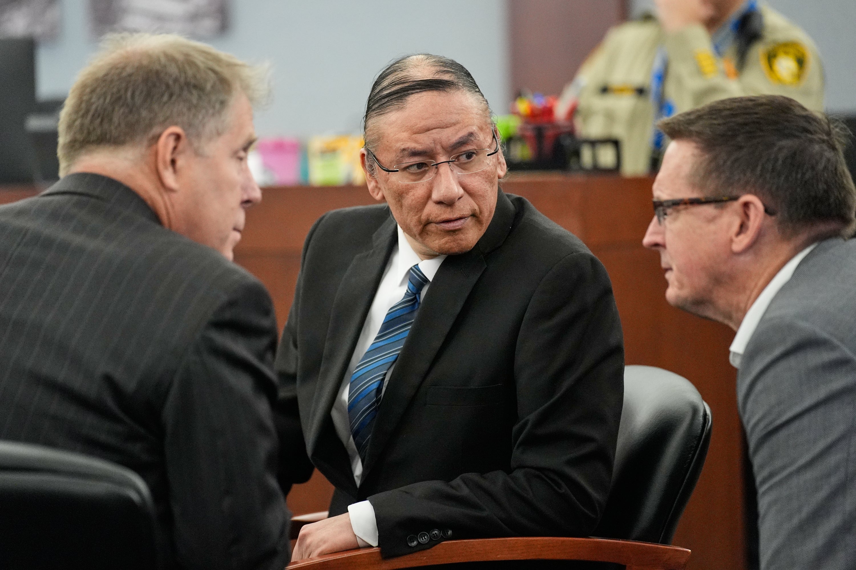 <p>Nathan Chasing Horse, center, confers with attorneys as he appears in court for his trial on charges of sexually abusing Indigenous women and girls Tuesday, Jan. 20, 2026, in Las Vegas. (AP Photo/John Locher)</p>