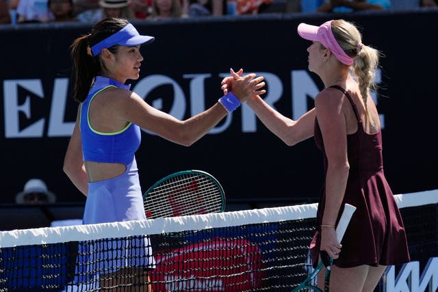 <p>Anastasia Potapova shakes hands with Emma Raducanu after beating the Brit at the Australian Open (Dar Yasin/AP)</p>