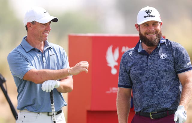 <p>Rory McIlroy and Tyrrell Hatton at the Abu Dhabi HSBC Championship </p>