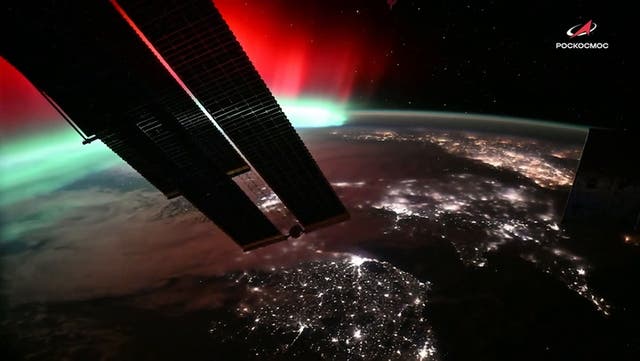 <p>See the Northern Lights from space as they glimmer above Earth.</p>