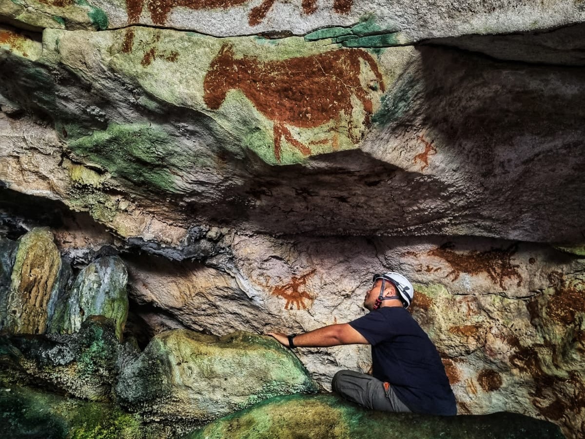 Photograph released by Griffith University's Maixme Aubert shows a view of prehistoric cave paintings in the Sulawesi island of Indonesia