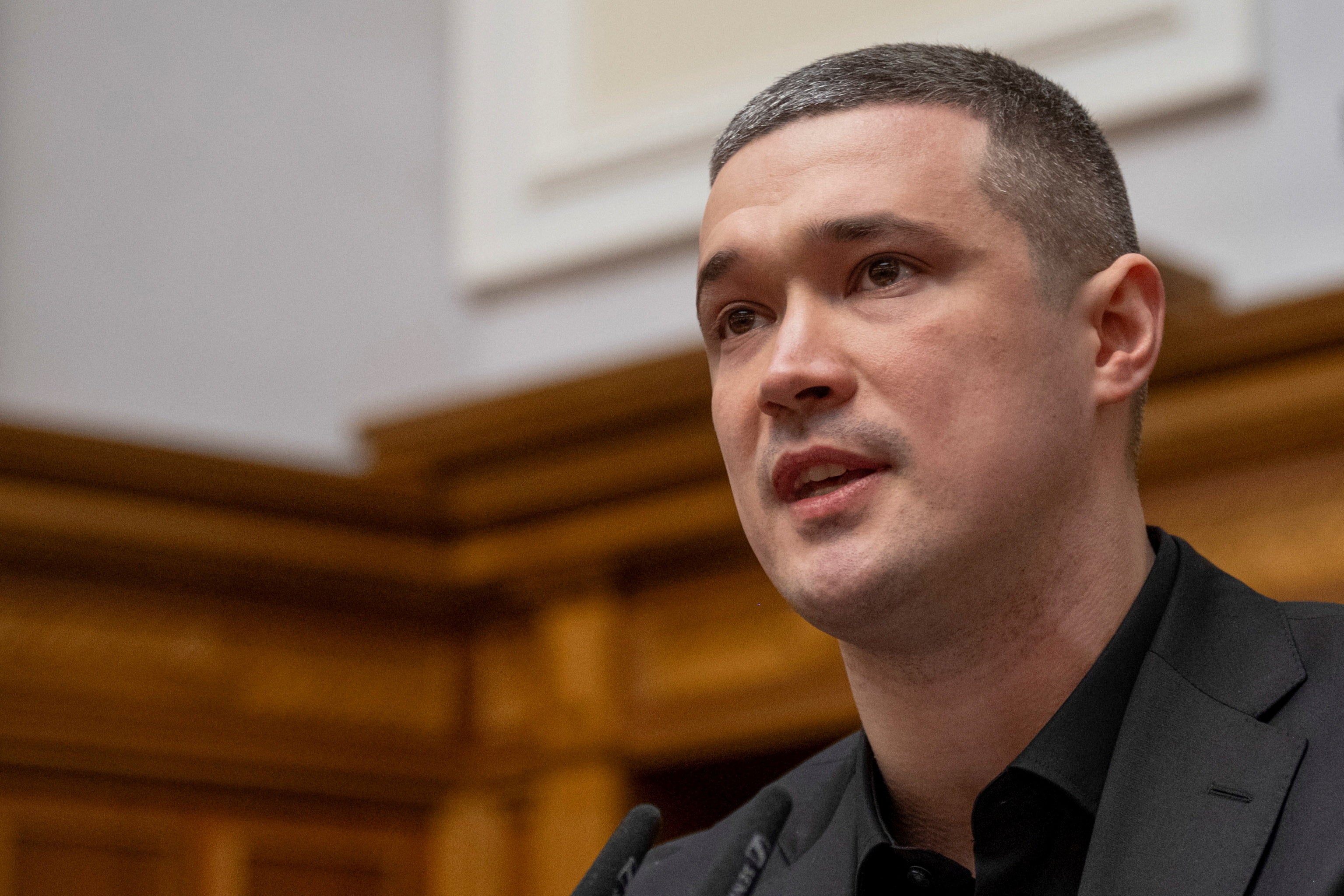 <p>Newly appointed defence minister Mykhailo Fedorov addresses lawmakers during a session of Ukrainian parliament amid Russia's attack on Ukraine, in Kyiv</p>
