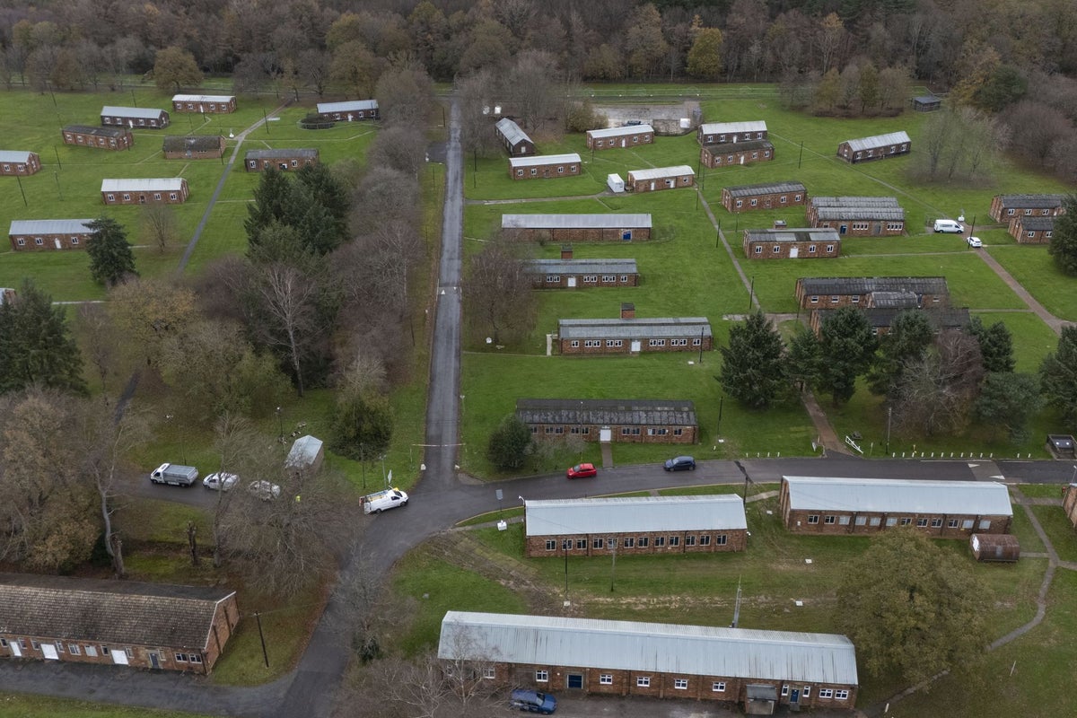 First asylum seekers moved into former army camp under Labour push to shut down migrant hotels