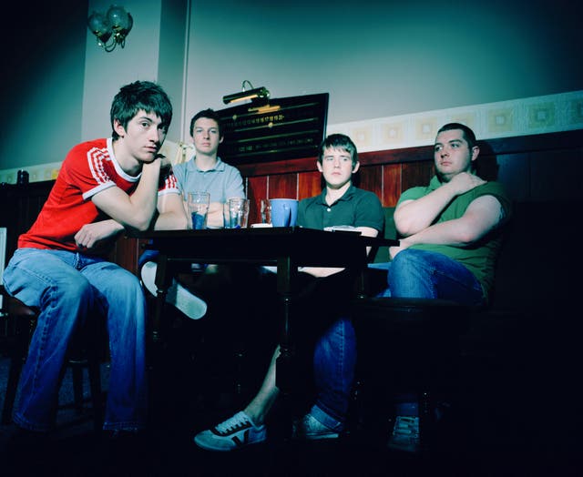 <p>Red lights indicate recording in process: Arctic Monkeys in 2006</p>